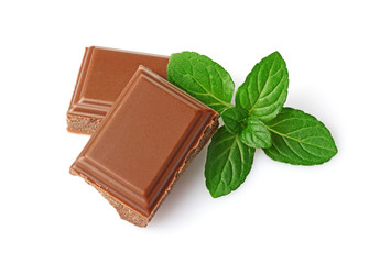 Close-up pieces of milk chocolate bar with mint