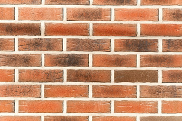 Decorative brickwork as decoration of building or house exterior facade wall close up