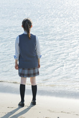 女子高生　海　後ろ姿　輝き