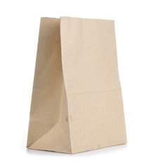 A used brown paper bag on a white background.