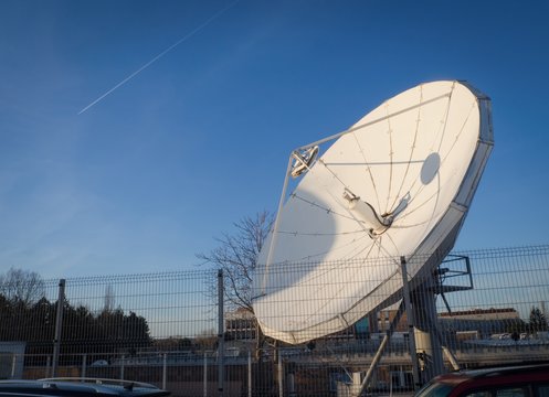 Satellite antenna on background of blue sky