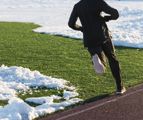 Running around the snow on the track