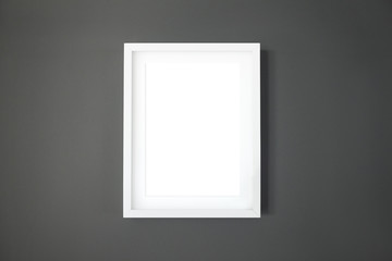 A4 white frame on grey wall