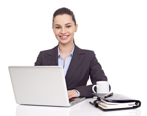 Business woman at desk isolated