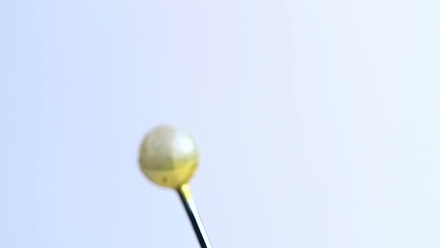 Tools tailor. Many multi-colored pins close-up. Shallow depth of field. Smooth rotation and impact.