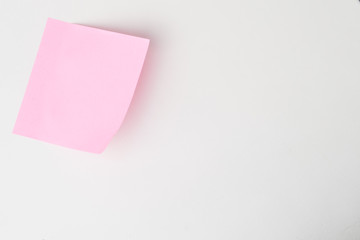 Pink paper on white table