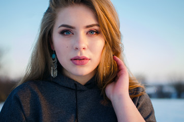 Fototapeta premium Young smiling girl in the winter