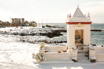 Santa Maria al Bagno after a exceptional snowfall, Salento, Italy