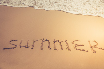 The inscription on the sand. Inscription on the bank of the ocean
