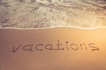 The inscription on the sand. Inscription on the bank of the ocean