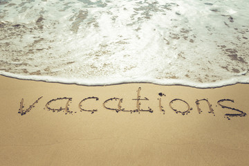 The inscription on the sand. Inscription on the bank of the ocean