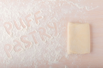 Puff pastry lettering (inscription).