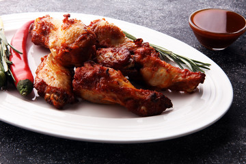 crispy barbecue chicken wings bbq on grey background