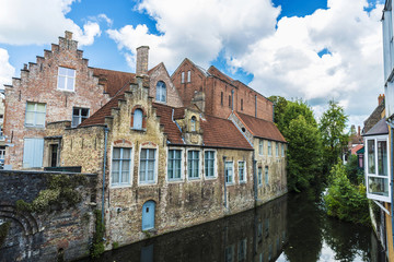 Old traditional houses along the river in Bruges, Belgium