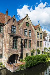 Old traditional houses along the river in Bruges, Belgium