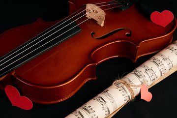 Fototapeta premium Violin, music notes and red hearts