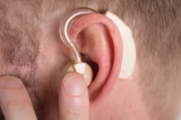 Man Wearing Hearing Aid