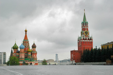 Moscow, Russia - May 12, 2006: St. Basil's Cathedral and Spasskaya tower in Kremlin. Red Square