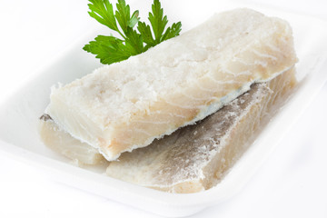 Salted dried cod isolated on white background. Typical Easter food

