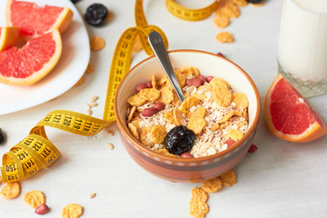 Useful breakfast from cereals, milk and fruits.