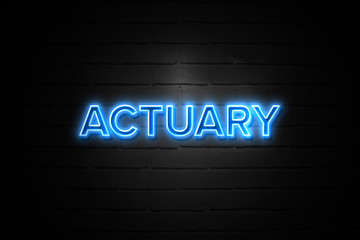 Actuary neon Sign on brickwall