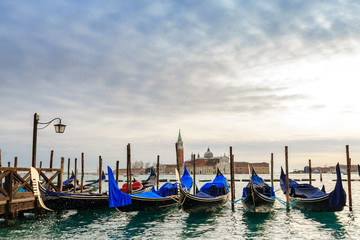 Fototapeta na wymiar Gondolas in the winter day, Venice, Italy