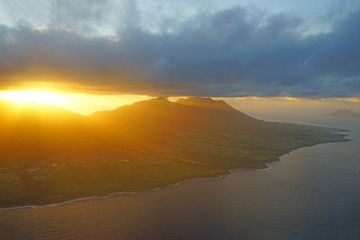 Fototapeta premium Aerial view of Mount Liamuiga on the volcanic Caribbean island of St Kitts at sunset