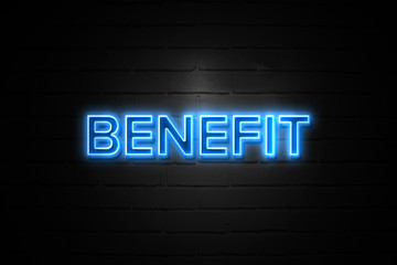 Fototapeta premium Benefit neon Sign on brickwall