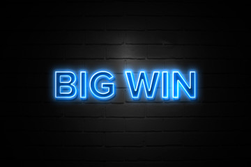 Big Win neon Sign on brickwall