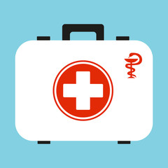 White first aid kit isolated on blue background. Health, help and medical diagnostics concept.