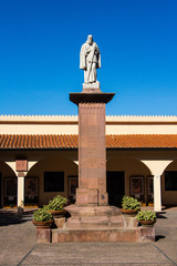 Fototapeta na wymiar LACONI, ITALIA - SETTEMBRE 29, 2014: Statua del santo, parte del monumento a lui dedicato nella piazza di Làconi - Sardegna