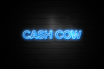 Cash Cow neon Sign on brickwall