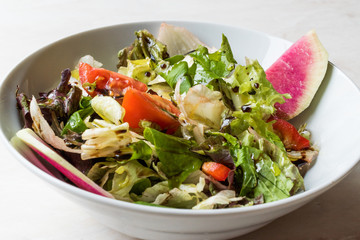 Fresh Homemade Radish Salad with Tomatoes and Balsamic Vinegar