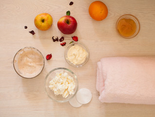 Homemade facial masks with natural ingredients, on color wooden background