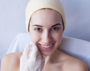 Woman in SPA salon. Facial skin care.soft skin. Beautiful SPA woman with smile relax in a salon. 