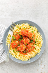 Pasta, vermicelli with meatballs in tomato sauce. Italian cuisine