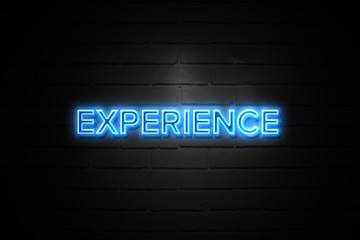 Obraz premium Experience neon Sign on brickwall