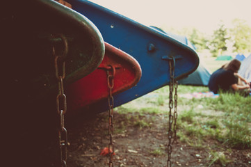 boats lying on the meadow for hobby rowing
