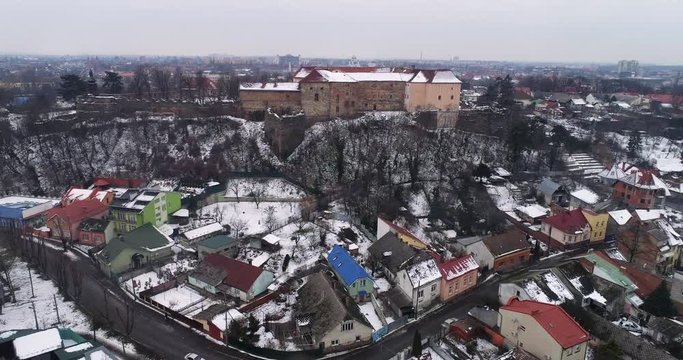 aerial beatiful grimly view on Uzhhorod Castle in winter.
