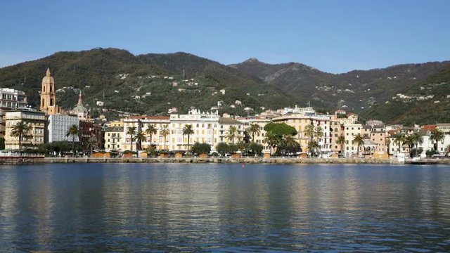 View of small scenic town of Rapallo with castle on Ligurian Sea coast of Italy