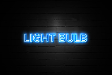 Obraz premium Light Bulb neon Sign on brickwall