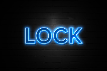 Lock neon Sign on brickwall