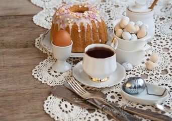 Easter feast, Easter cake and painted eggs 