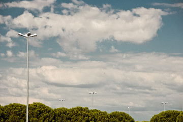 futuristic street lamp in front of sky © Jonathan Schöps