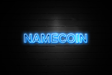 Namecoin neon Sign on brickwall