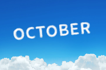 Word October made of clouds steam on blue sky background. Month planning, timetable concept.