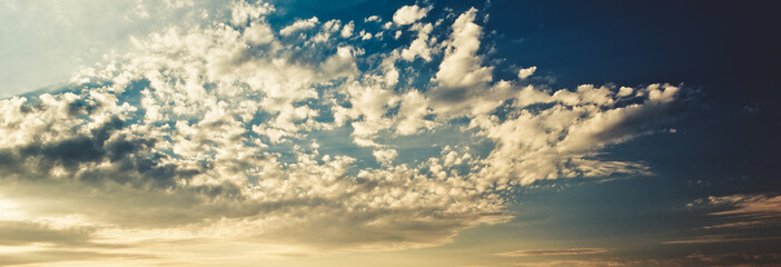 Naklejka na ściany i meble Beautiful Sunset Sky panorama with clouds