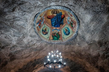 Obraz na płótnie Canvas chandelier in cathedral deep underground - salt mine in Targu Ocna