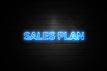 Obraz premium Sales Plan neon Sign on brickwall