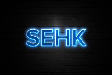 Fototapeta na wymiar Sehk neon Sign on brickwall